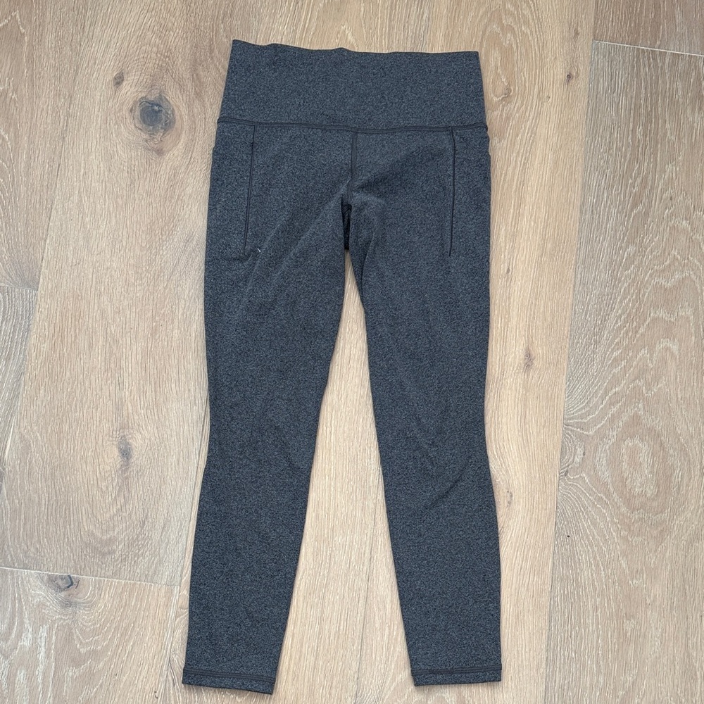 Athleta Dark Heather Gray Salutation Stash Pocket II 7/8 Leggings - Size Small